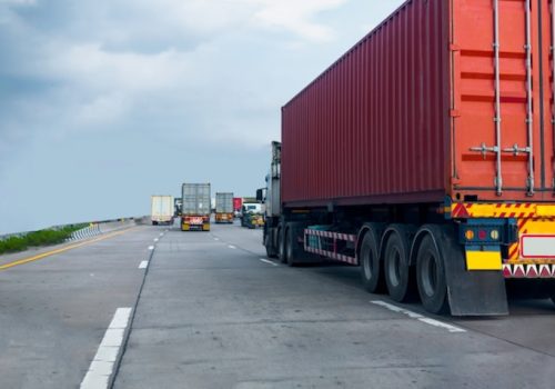 fpkdl.com_960_images_fpkdl.com_960_truck-highway-road-with-red-container-logistic-industrial-transporting-land-transport-asphalt_42493-239